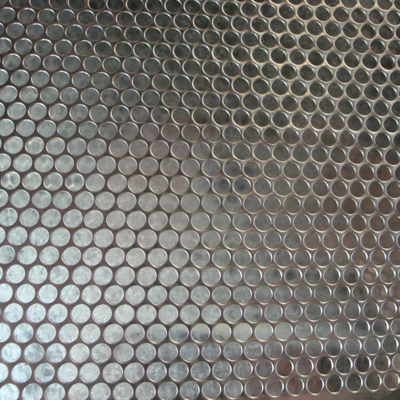 微孔沖孔網(wǎng)沖床的改進